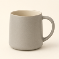 Ceramic mug on a neutral backdrop