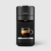 Sleek coffee machine with a cup